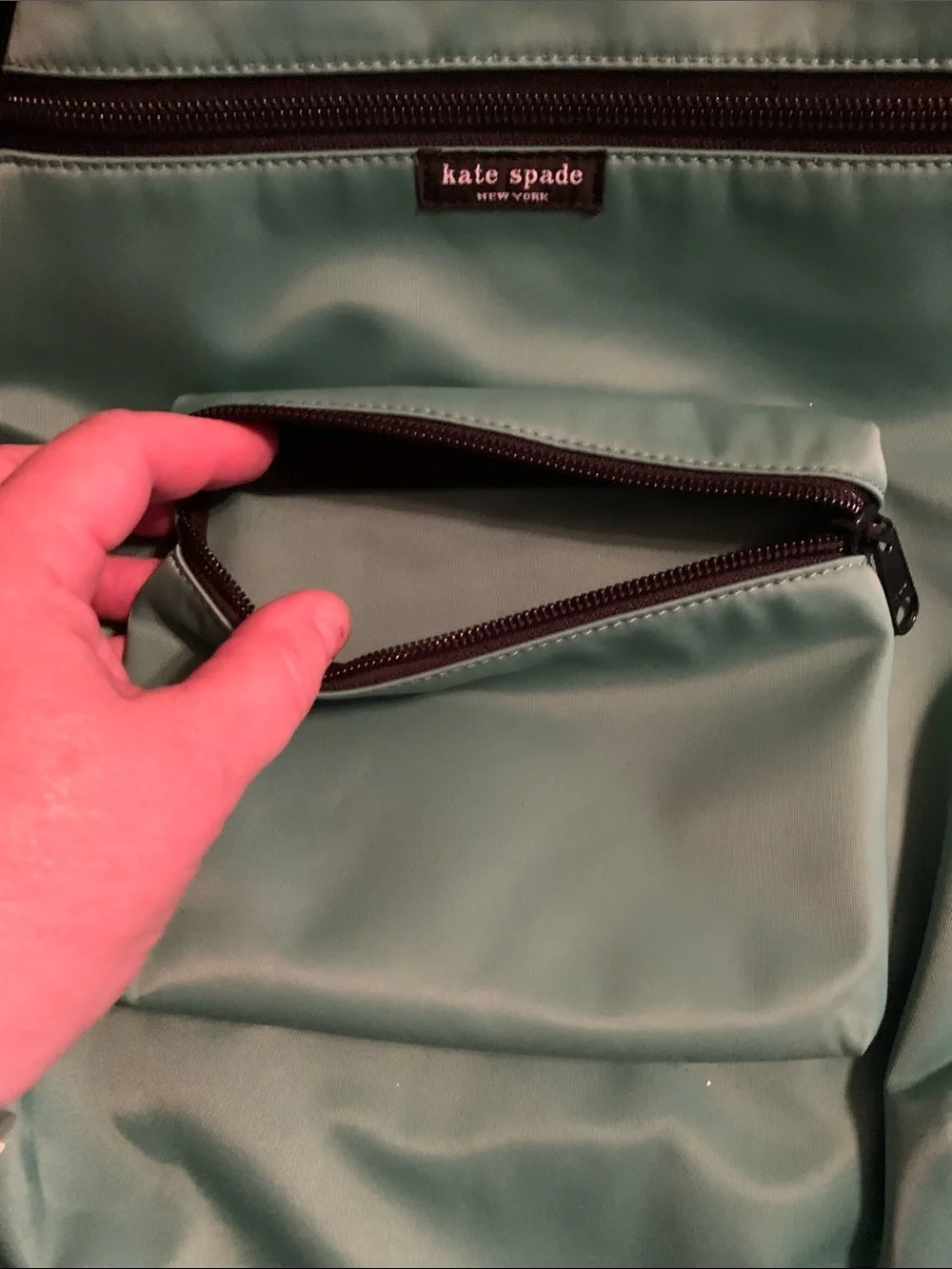 kate spade Teal Green Backpack – Front Zip Pocket
